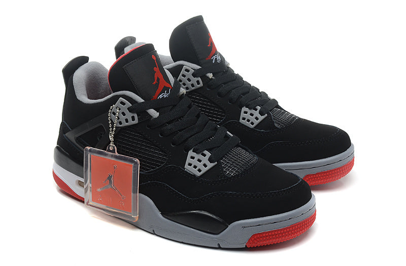 Jordan 4 Retro Basketball Shoes in Black/Red - product image from the listing.