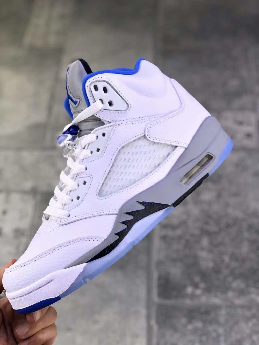 Air Jordan 5 Stealth 2.0 Sneakers in White Blue 440888-140 - product image from the listing.