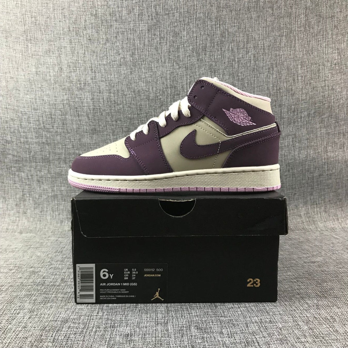 Air Jordan 1 Mid GS Sneakers in White Purple Pink - product image from the listing.