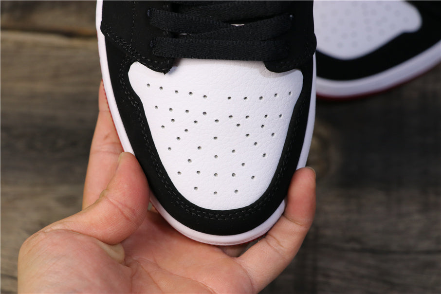 Air Jordan 1 Low Black Toe Sneakers 553558-116 - product image from the listing.
