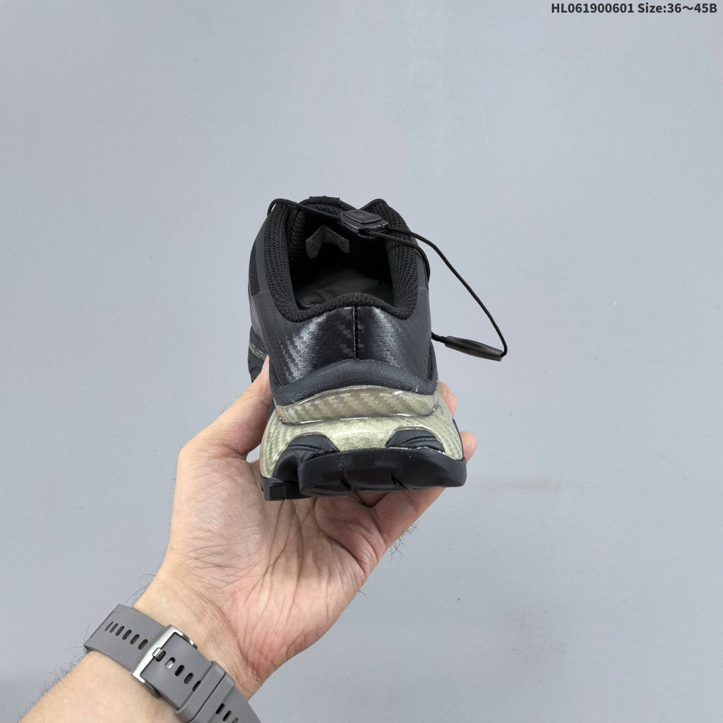 Black and Silver Salomon XT-4 Mule Sneakers - product image from the listing.