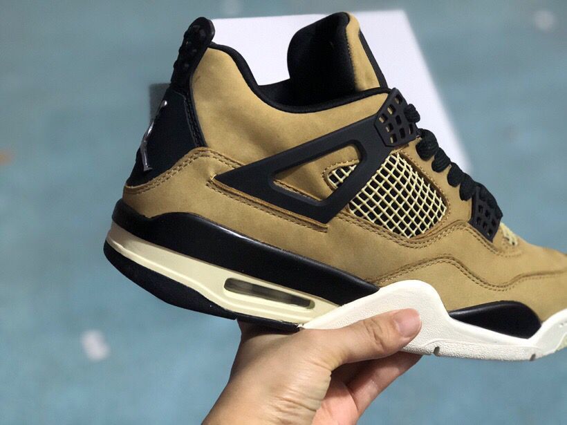 Jordan 4 Retro Sneakers in Tan Black - product image from the listing.
