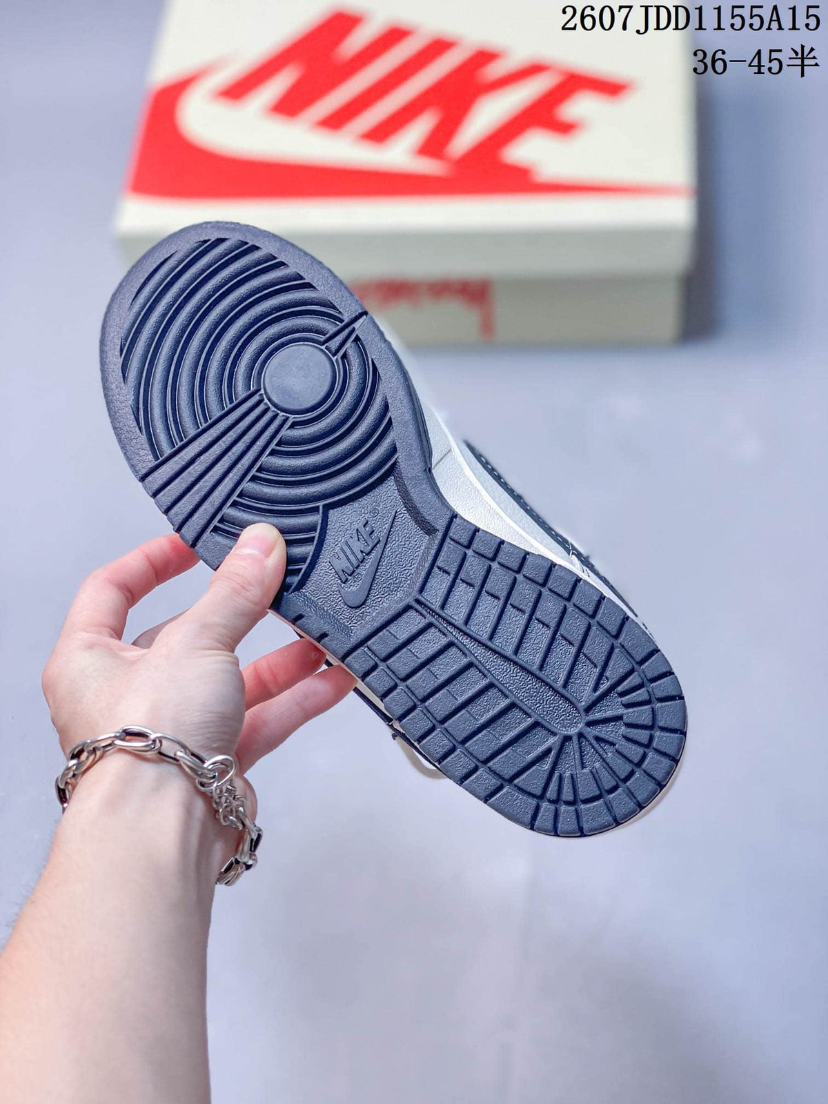 Nike SB Dunk Low Sneakers in Gray White Navy - product image from the listing.