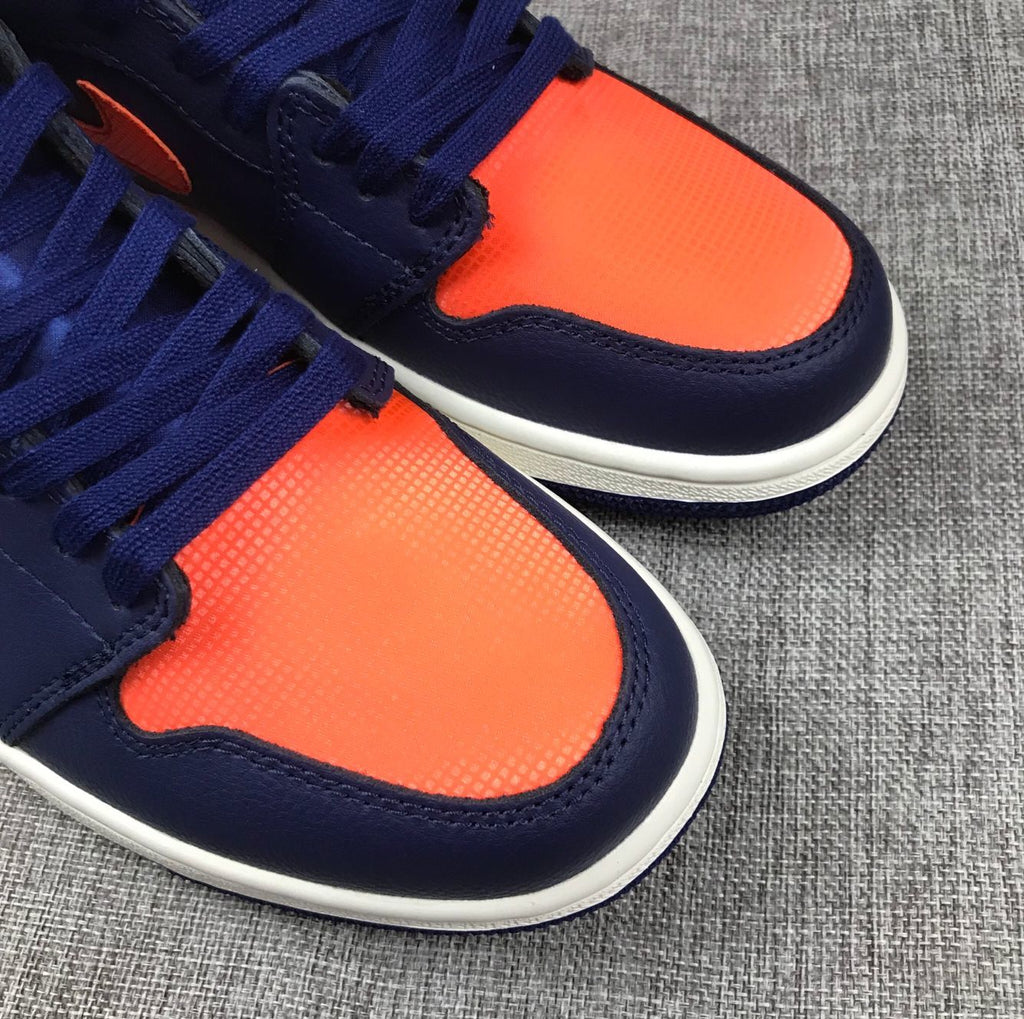 Air Jordan 1 Mid Sneakers in Blue Orange AH7389-408 - product image from the listing.