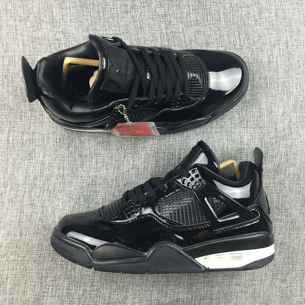 Air Jordan 4 Black Glossy Sneakers - product image from the listing.