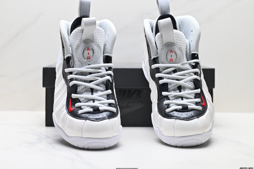 Nike Air More Uptempo Basketball Sneakers in White and Black - product image from the listing.