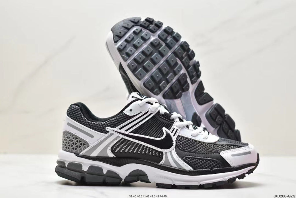 Nike Air More Uptempo Sneakers in Black and White - product image from the listing.
