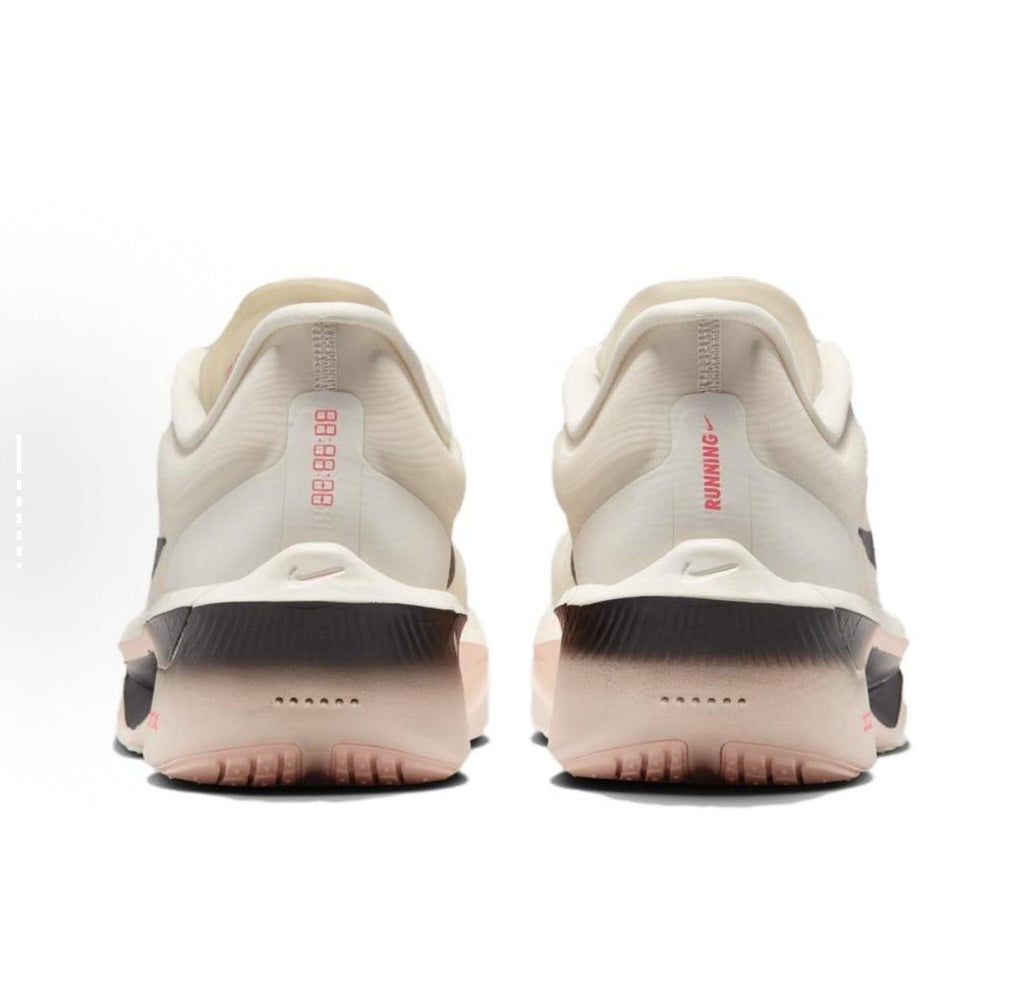 Light Beige and Black Nike ZoomX Running Shoes - product image from the listing.