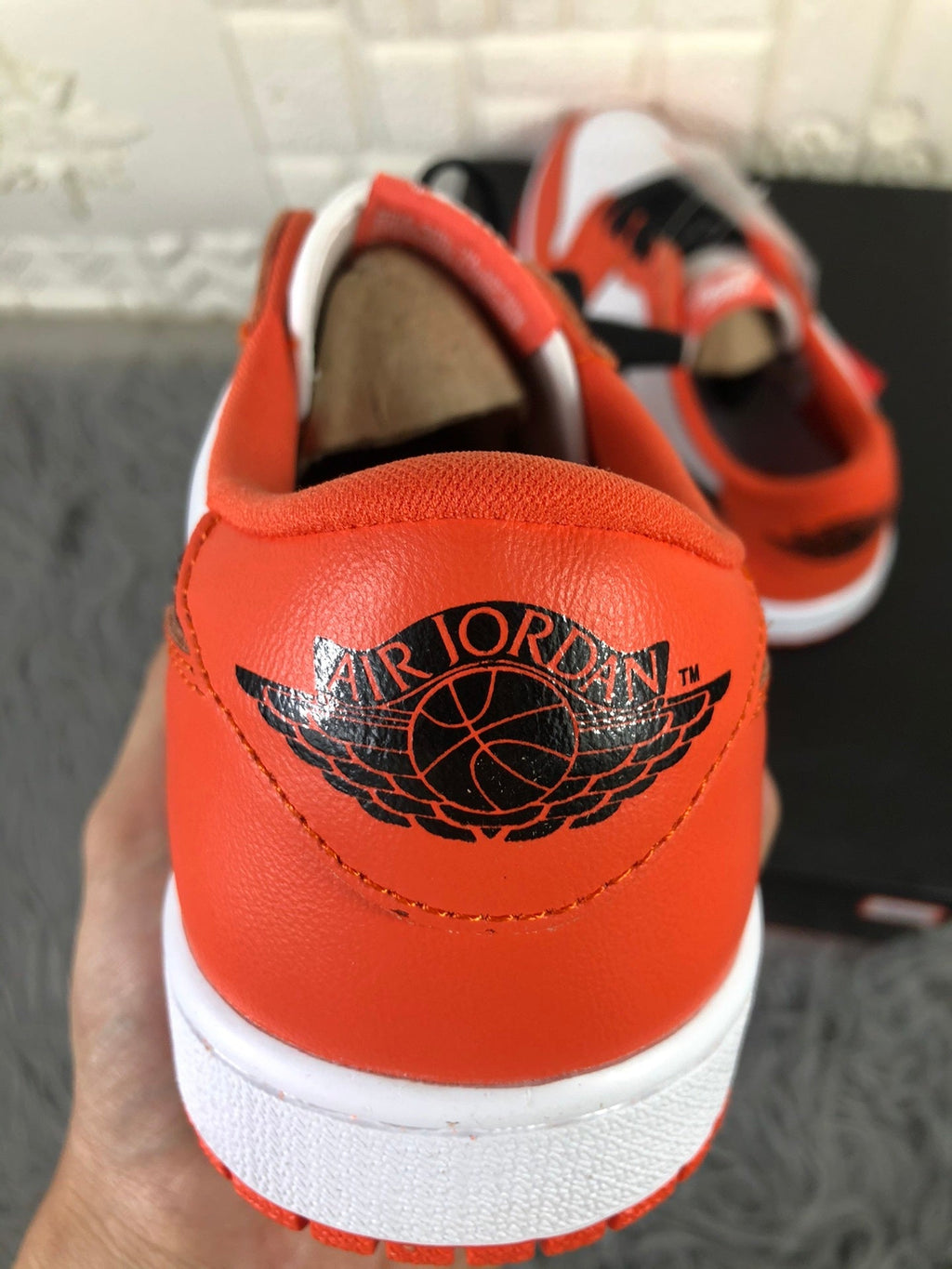 Nike Air Jordan 1 Low Sneakers in White Orange CZ0790-801 - product image from the listing.