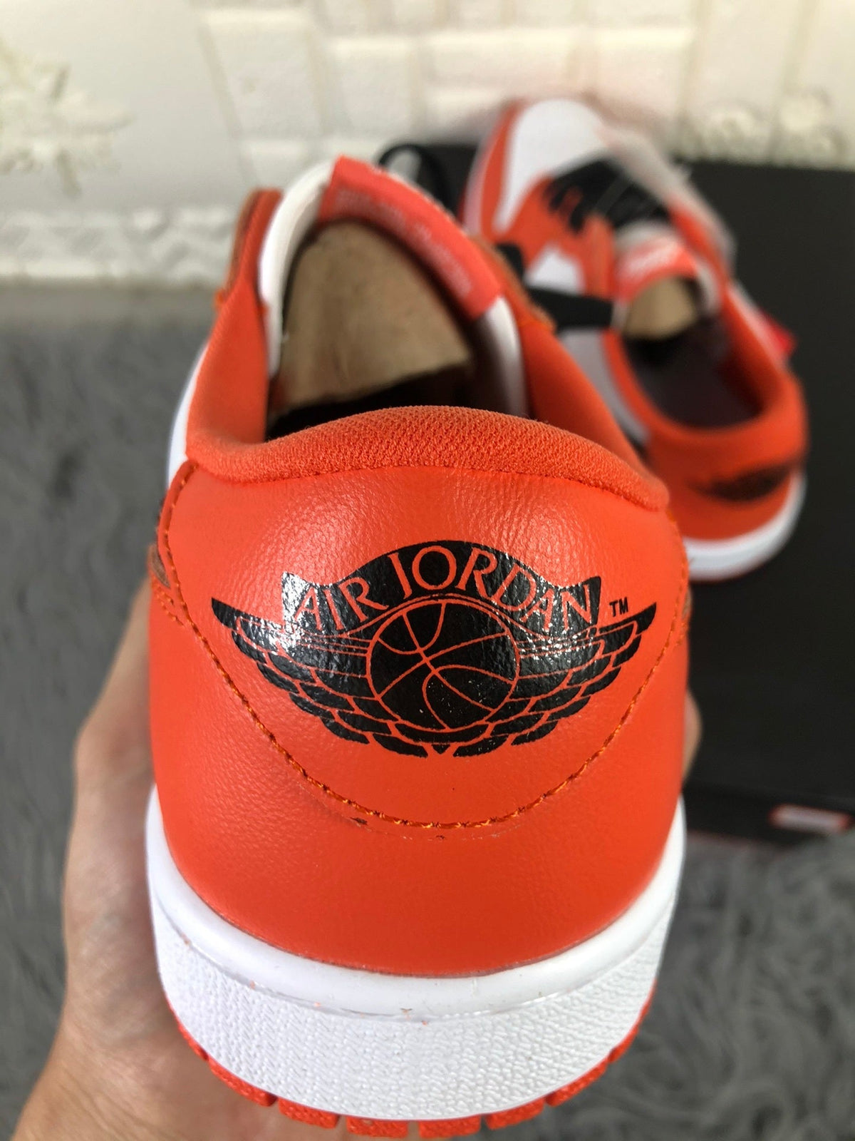 Nike Air Jordan 1 Low Sneakers in White Orange CZ0790-801 - product image from the listing.