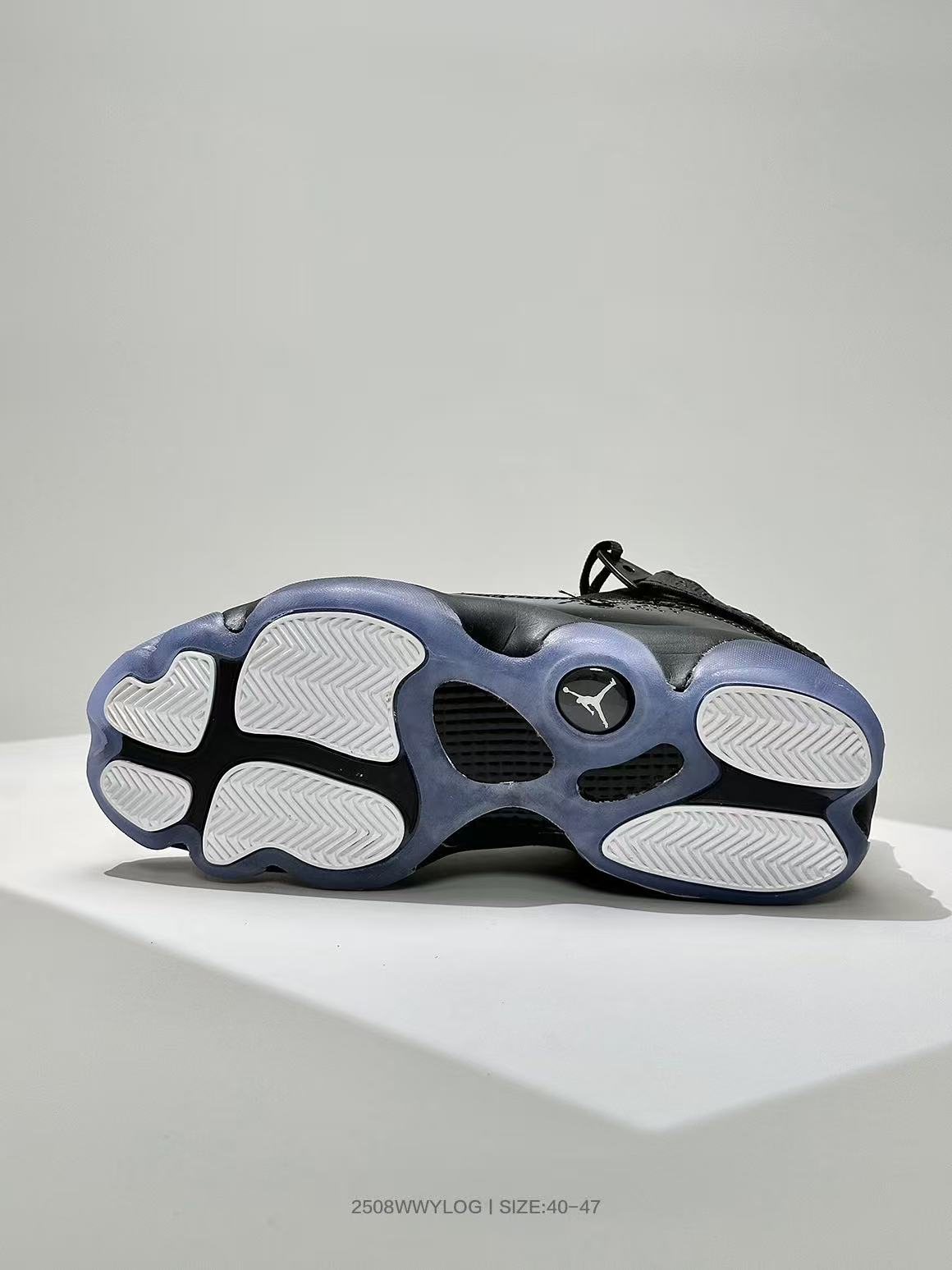 Jordan 6-4 High-Top Sneakers in Black - product image from the listing.