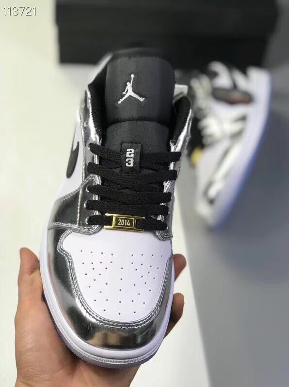 Jordan 1 Low Leonard Sneakers in Silver and White - product image from the listing.