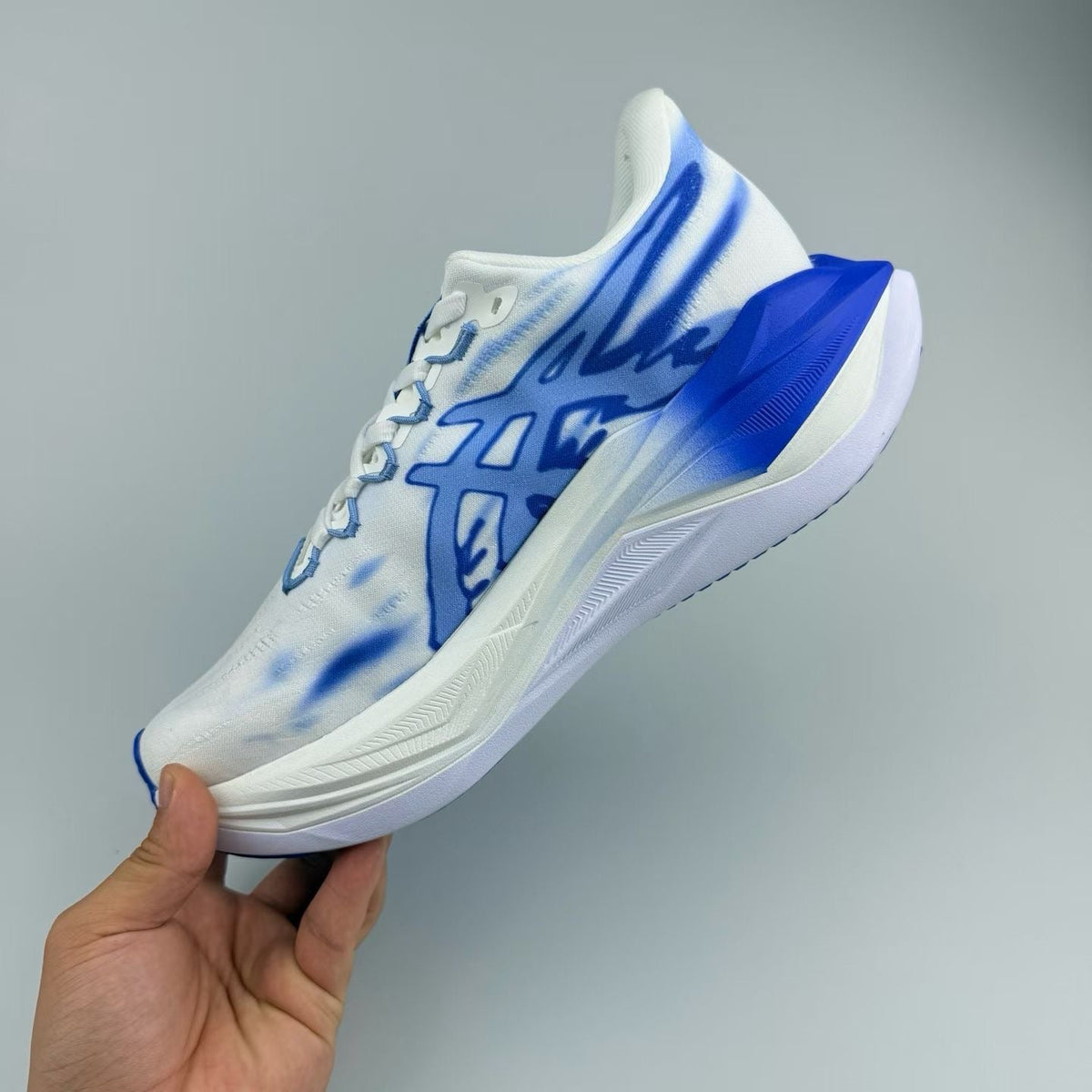 ASICS GEL-KAYANO 14 Running Sneakers in White Blue 1013A177-600 - product image from the listing.