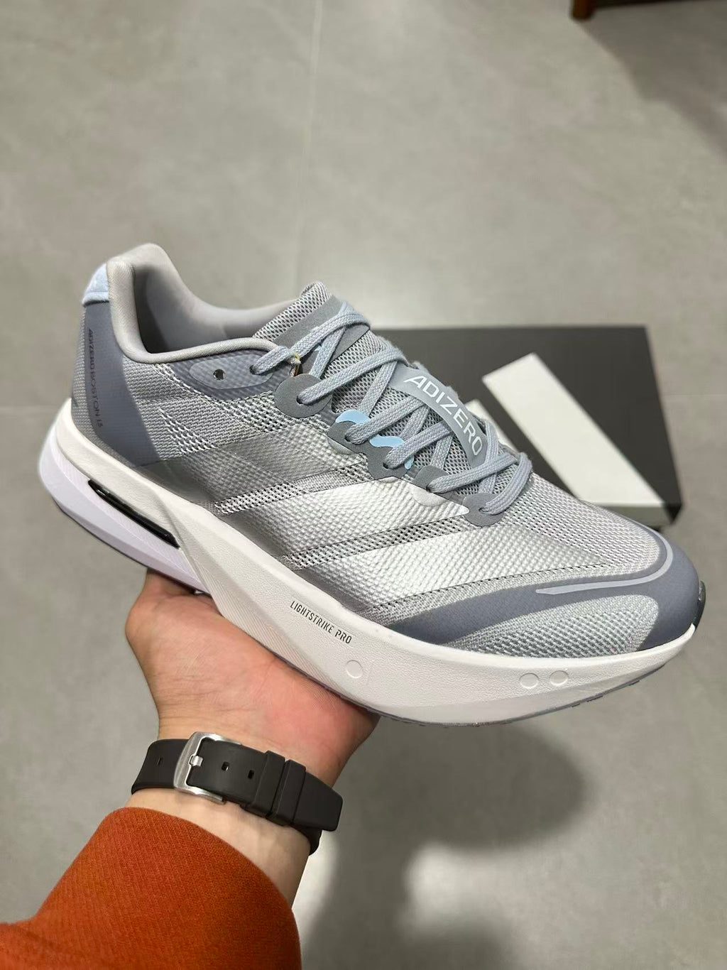 Nike ZoomX Invincible Run 4 Road Running Shoes in Grey - product image from the listing.