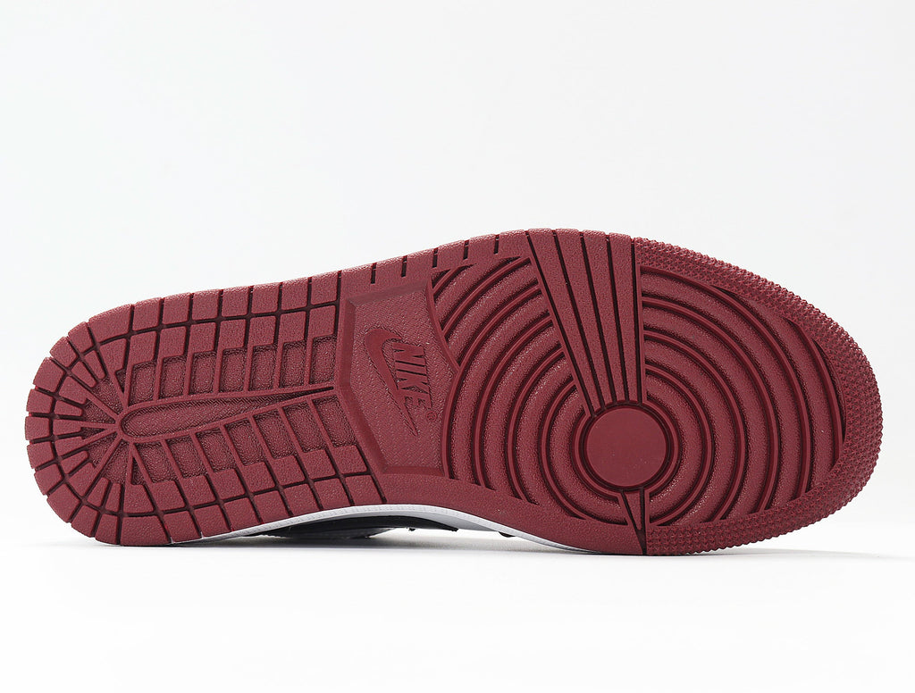 Jordan 1 Low White and Rose Sneakers in Red 553558-604 - product image from the listing.