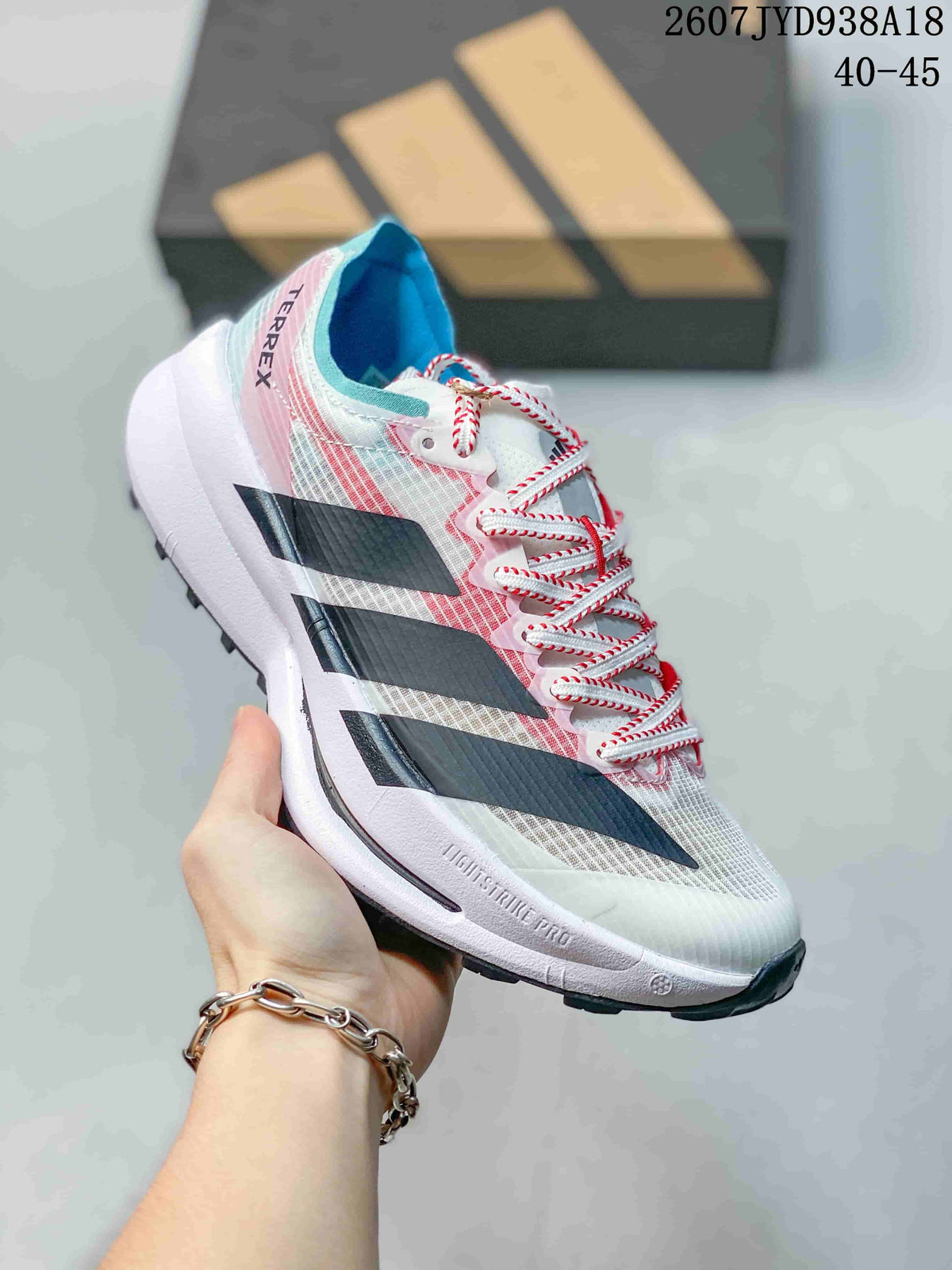 Adidas Adizero Evo SL 2 Running Shoes in White Pink Blue - product image from the listing.