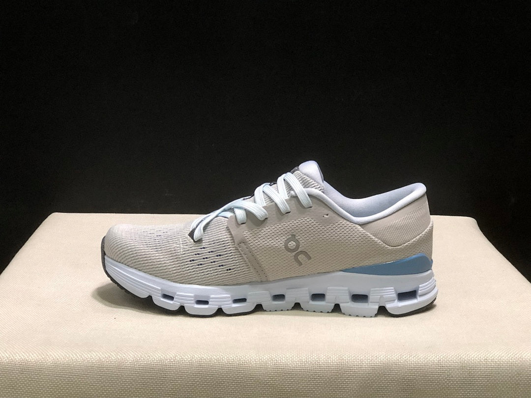 Silver and Blue On Cloud X 4 Sneakers - product image from the listing.