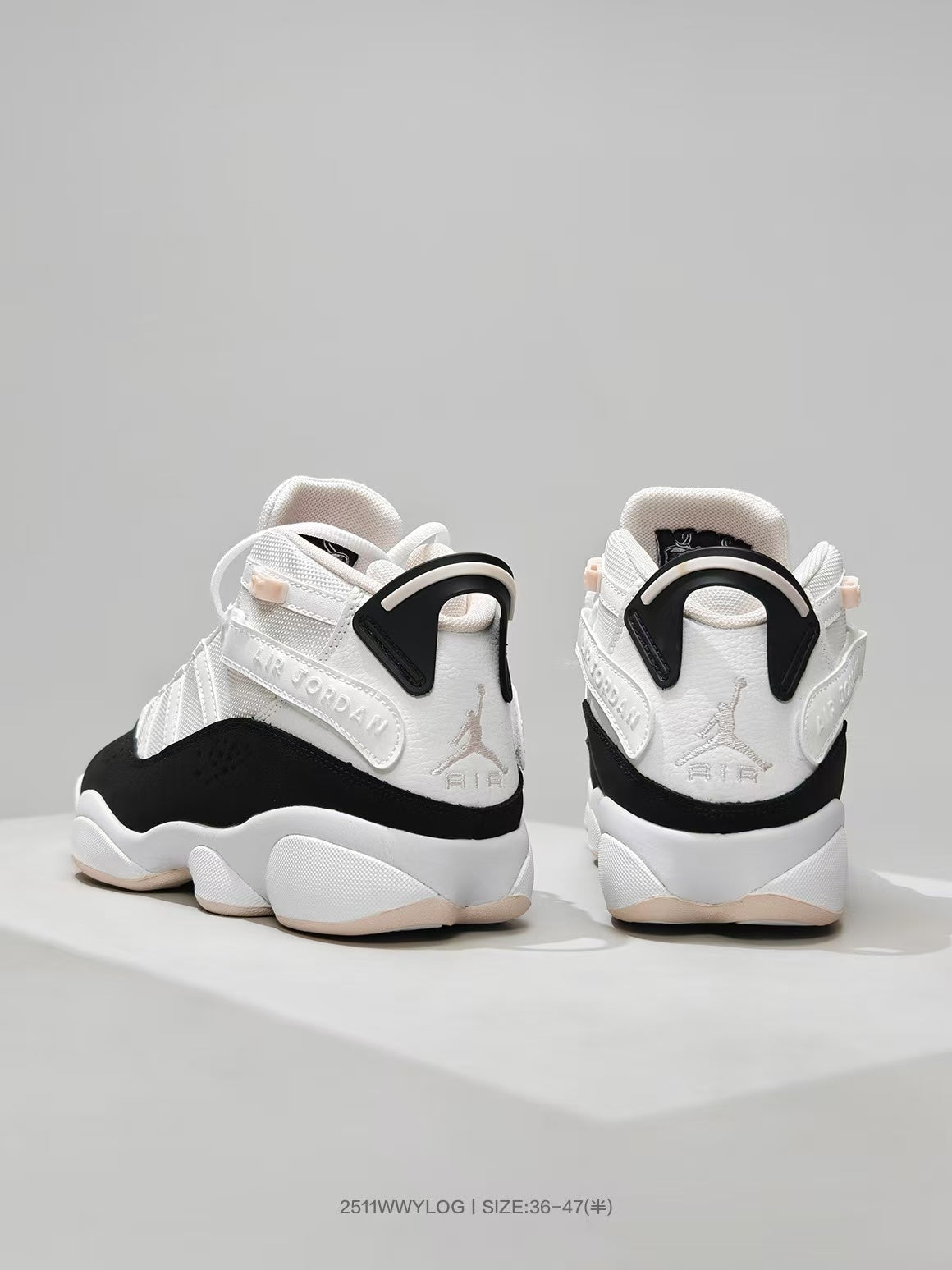 Jordan 8 Sneakers in White Black Pink - product image from the listing.