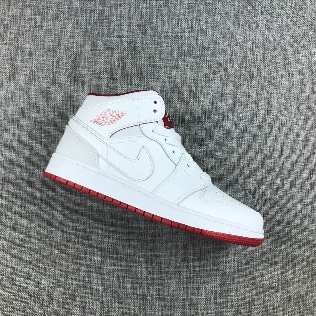 Air Jordan 1 Mid Sneakers in White and Red 554725-103 - product image from the listing.