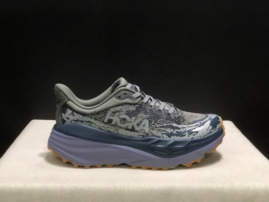 Gray HOKA Stinson 7 Trail Running Shoes - product image from the listing.