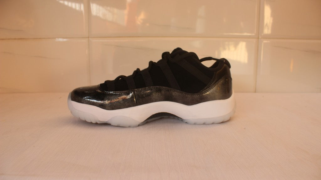 Air Jordan 11 Low Barons Black Sneakers - product image from the listing.