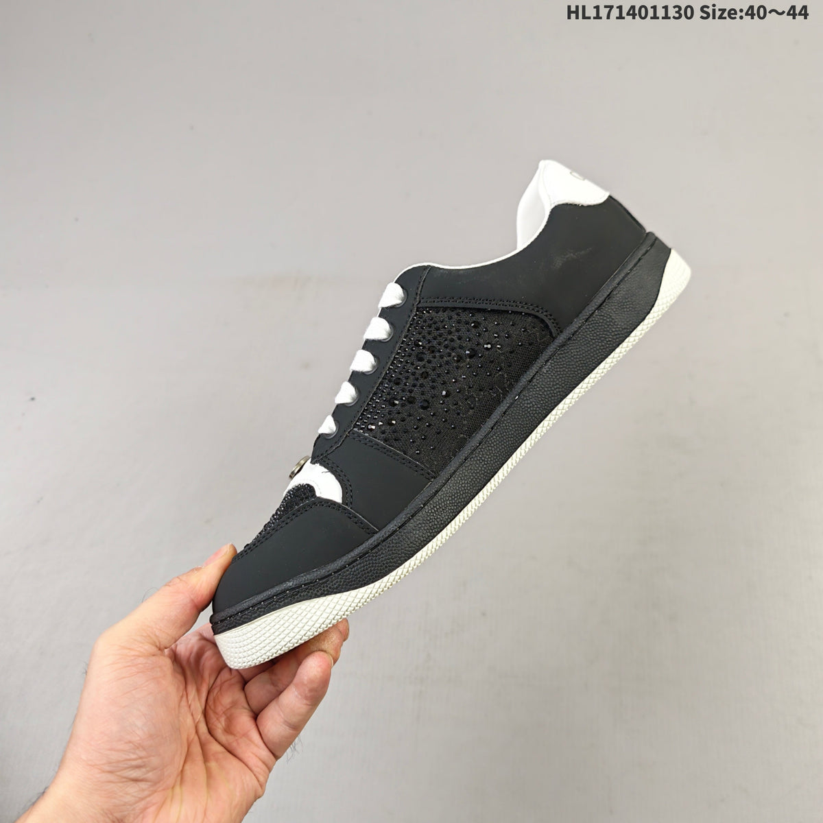 Gucci Screener Distressed Low-Top Sneakers in Black and White HL171401130 - product image from the listing.