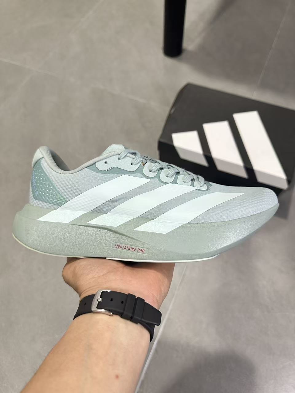Adidas Lightstrike Pro Running Shoes, in Pale Green - product image from the listing.