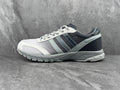 Gray and Black Three-Stripe Low-Cut Sneakers - product image from the listing.