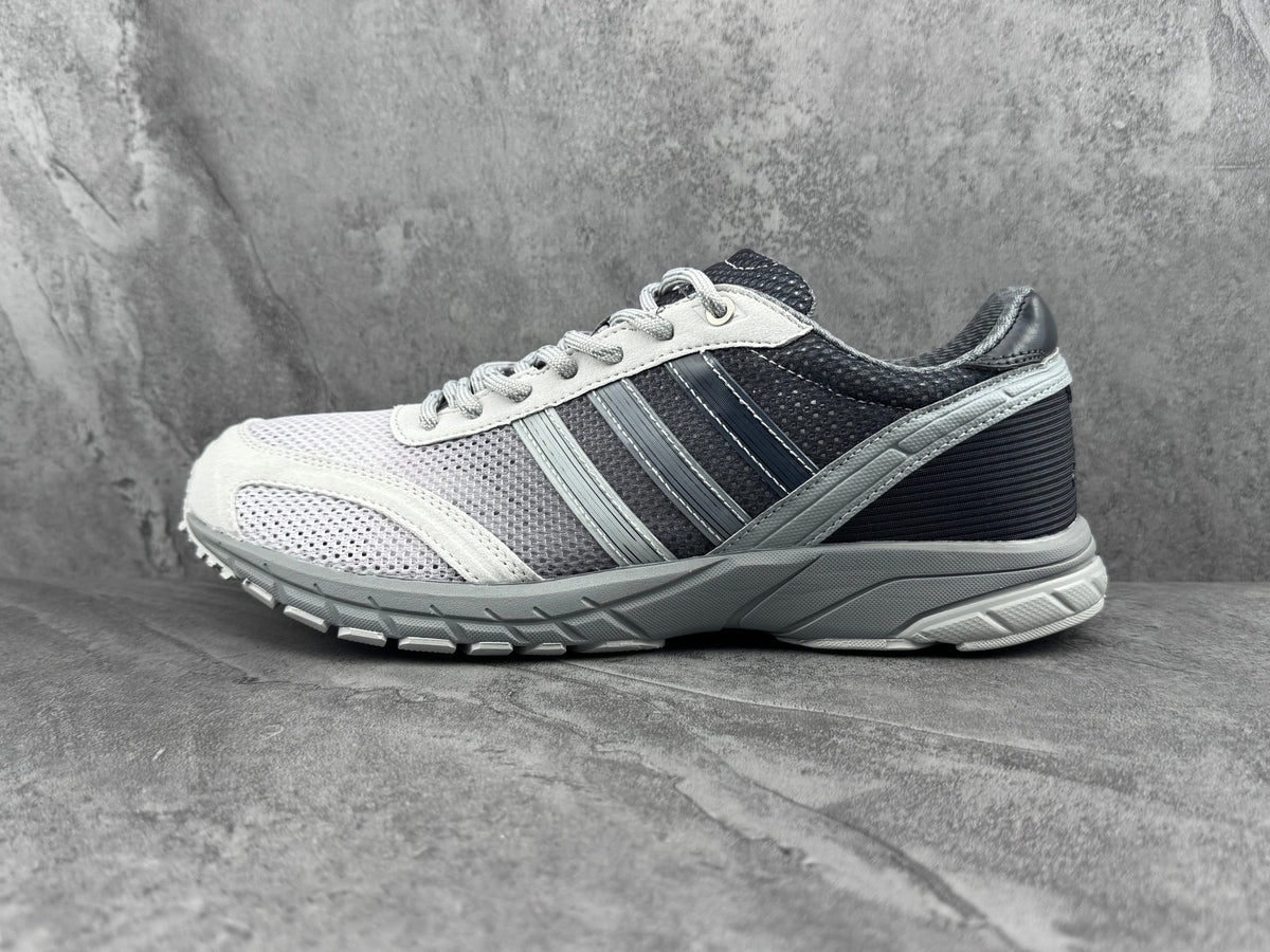 Gray and Black Three-Stripe Low-Cut Sneakers - product image from the listing.