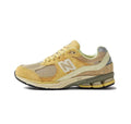 Tan New Balance 2002R M2002RE1 Sneakers - product image from the listing.