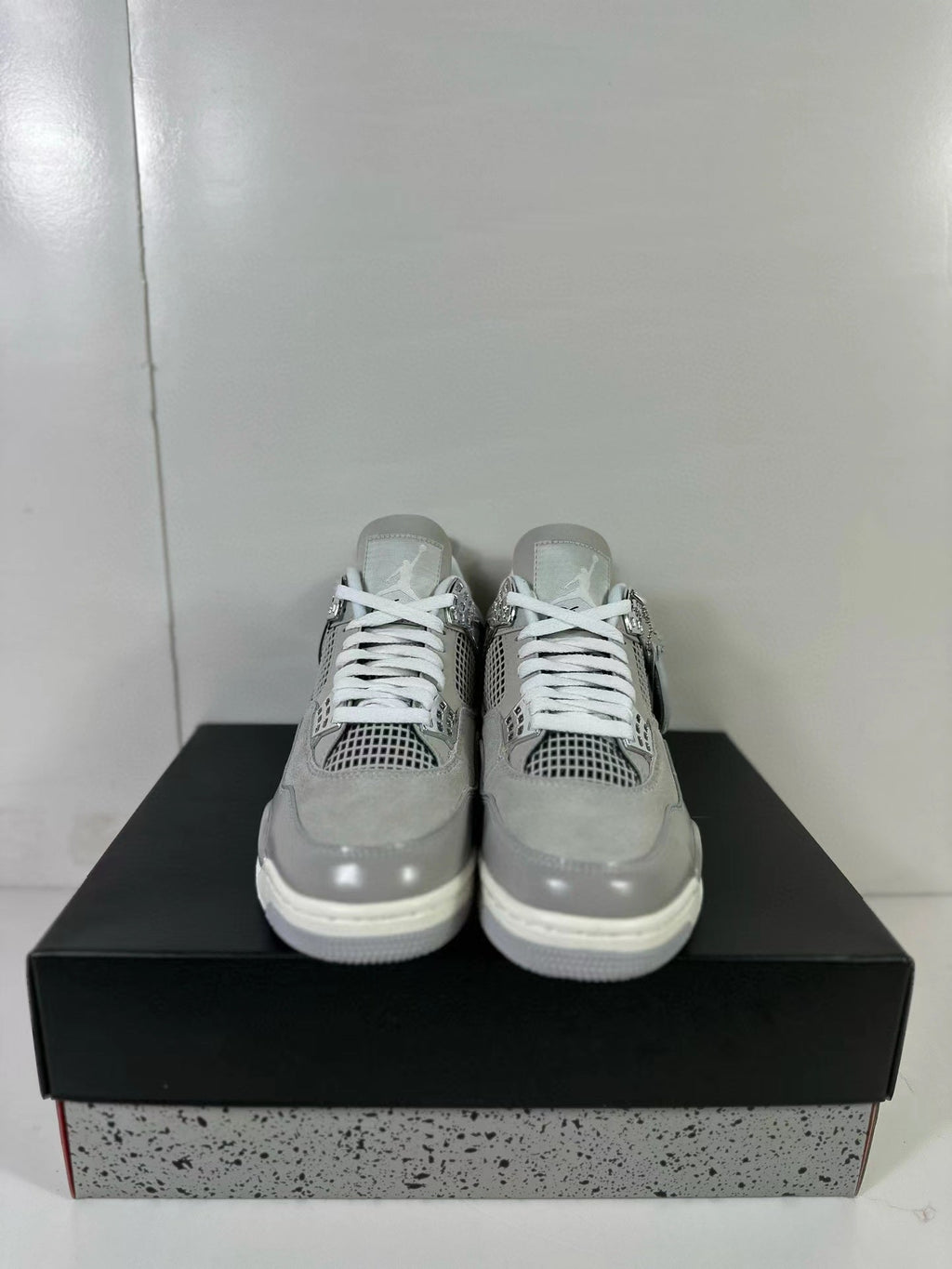 Air Jordan 4 Light Iron Ore Frozen Moments Sneakers - product image from the listing.