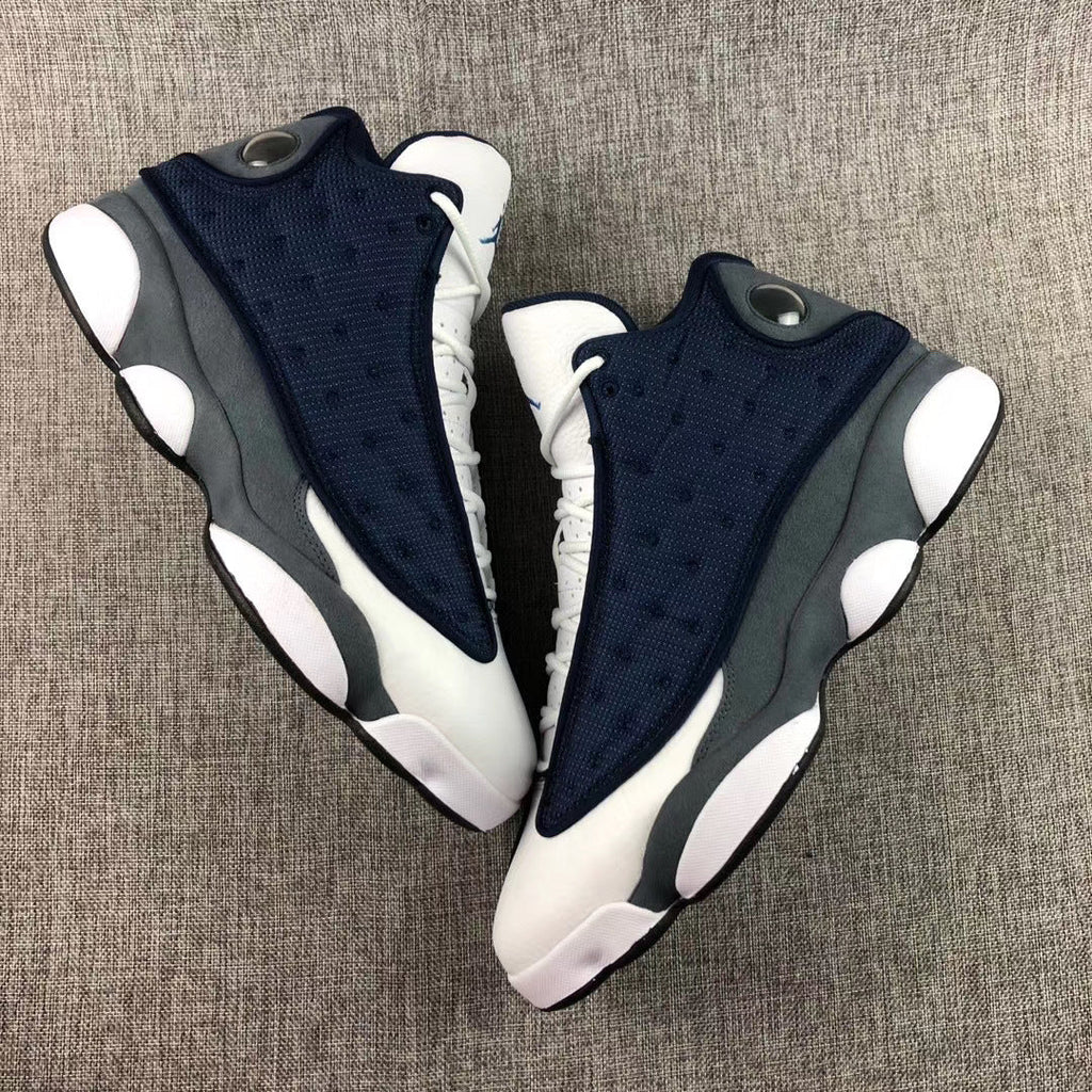 Air Jordan 13 Flint Navy Sneakers 414571-404 - product image from the listing.