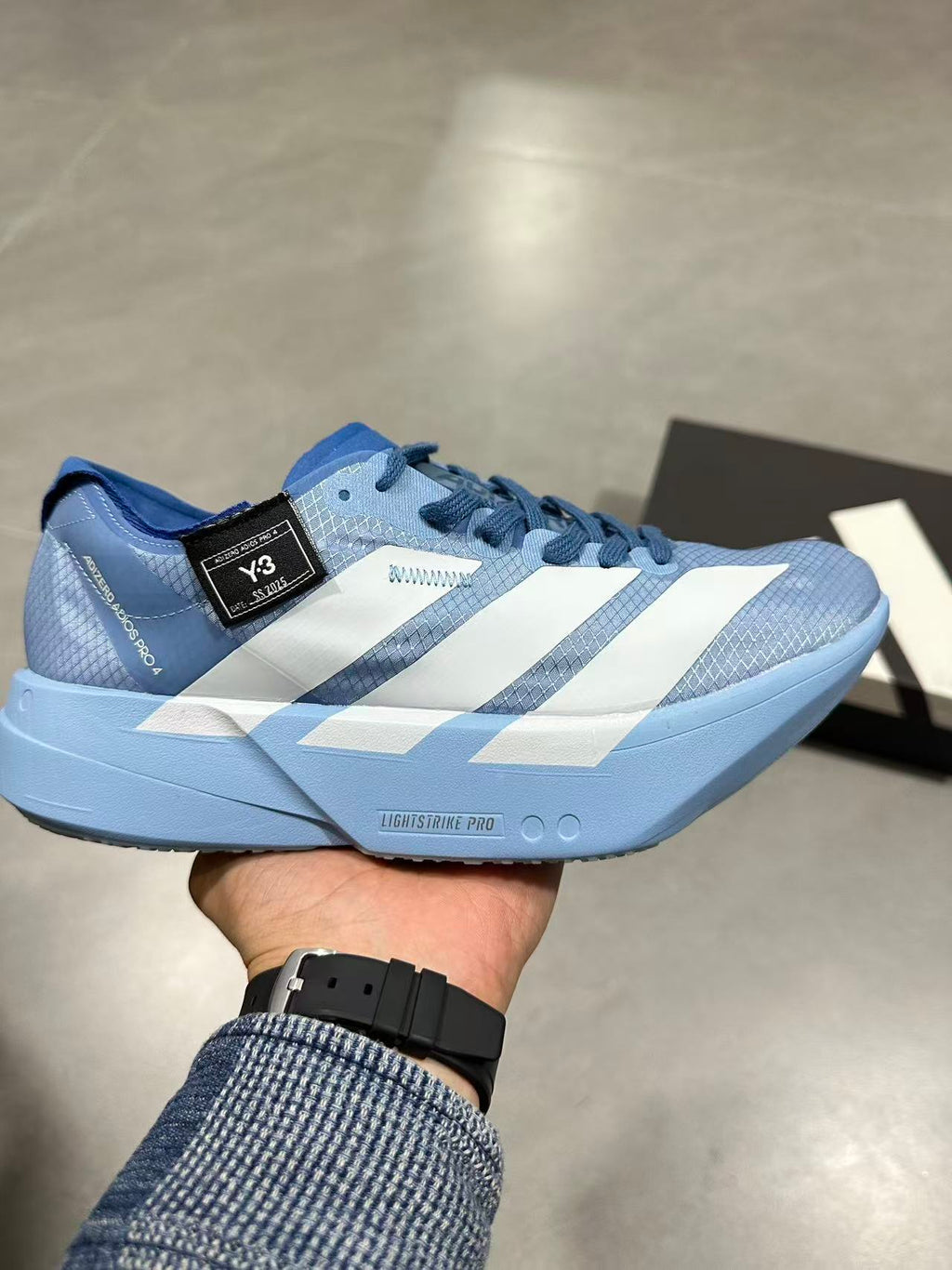 Blue Adidas Lightstrike Pro Running Shoes - product image from the listing.