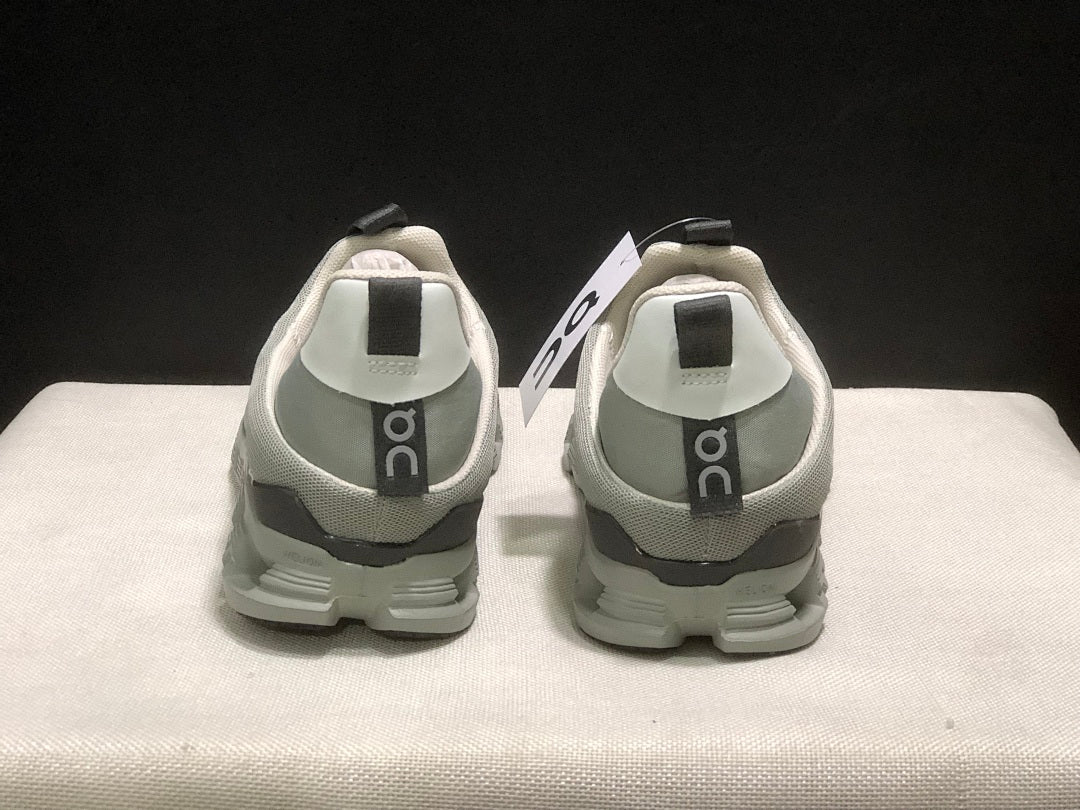 On Cloud 4 Coast Slip-On Sneakers, in Dark Grey - product image from the listing.