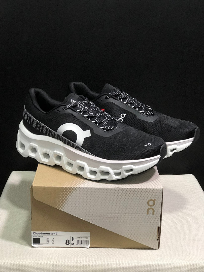 On Cloudmonster 2 Running Shoes in Black White - product image from the listing.