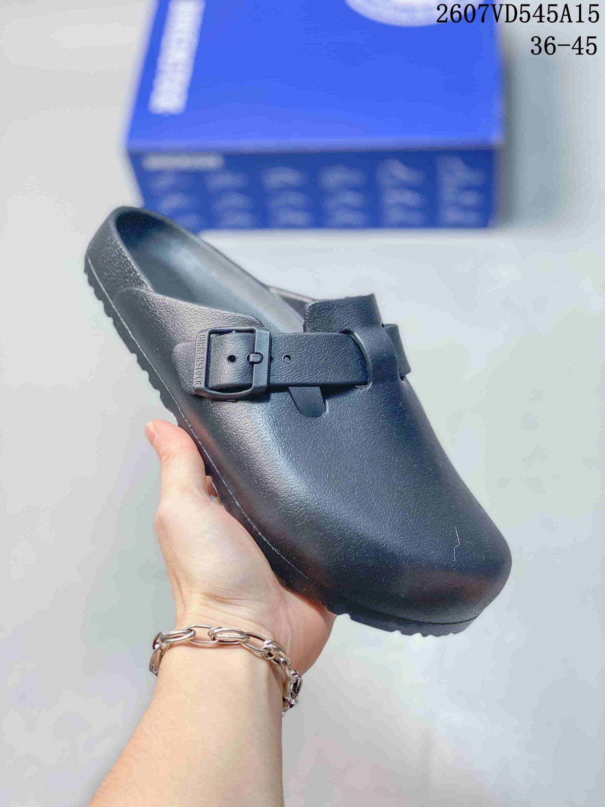 Birkenstock Madrid Big Buckle EVA Clog Sandals in Black - product image from the listing.