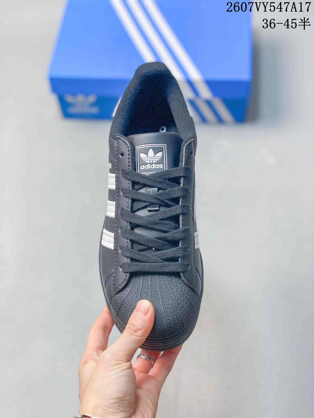 Adidas Originals Superstar Sneakers in Black and White - product image from the listing.