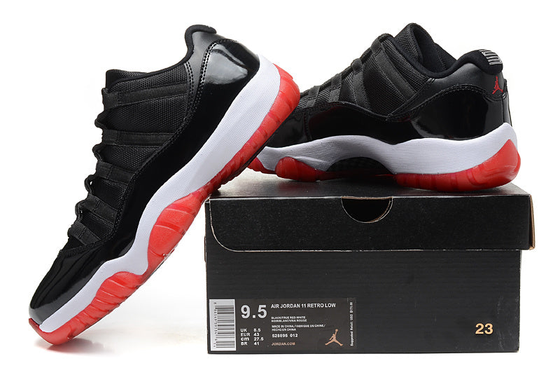 Air Jordan 11 Retro Low Black and Red Sneakers - product image from the listing.