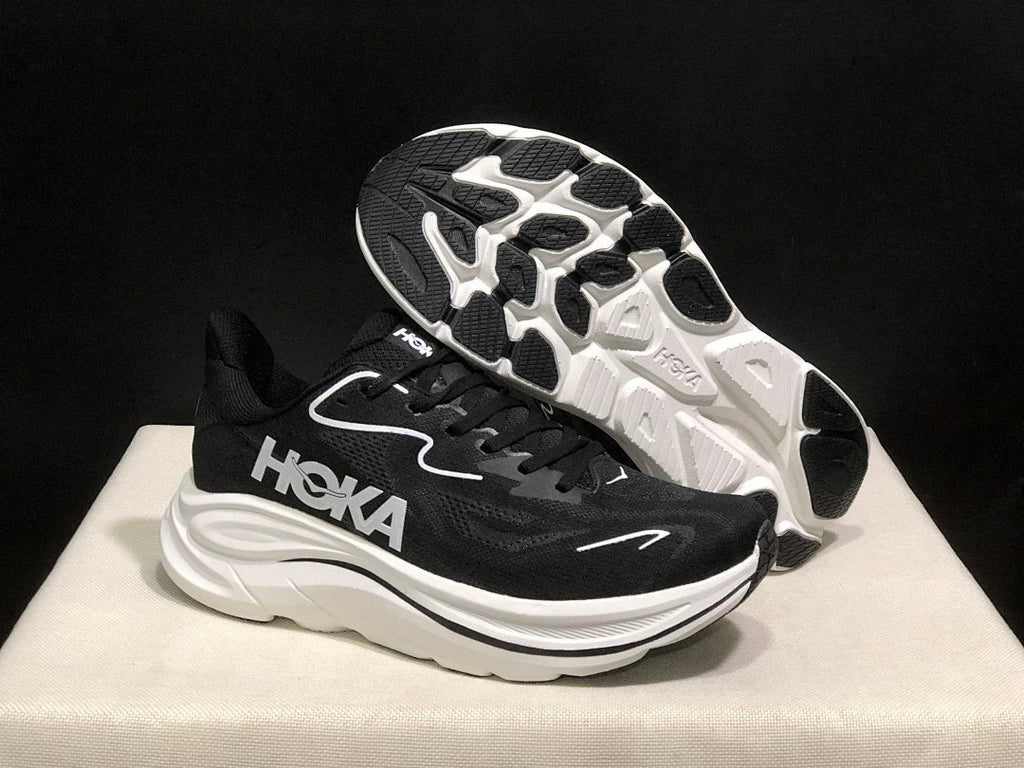 HOKA Clifton 10 Running Shoes in Black and White - product image from the listing.