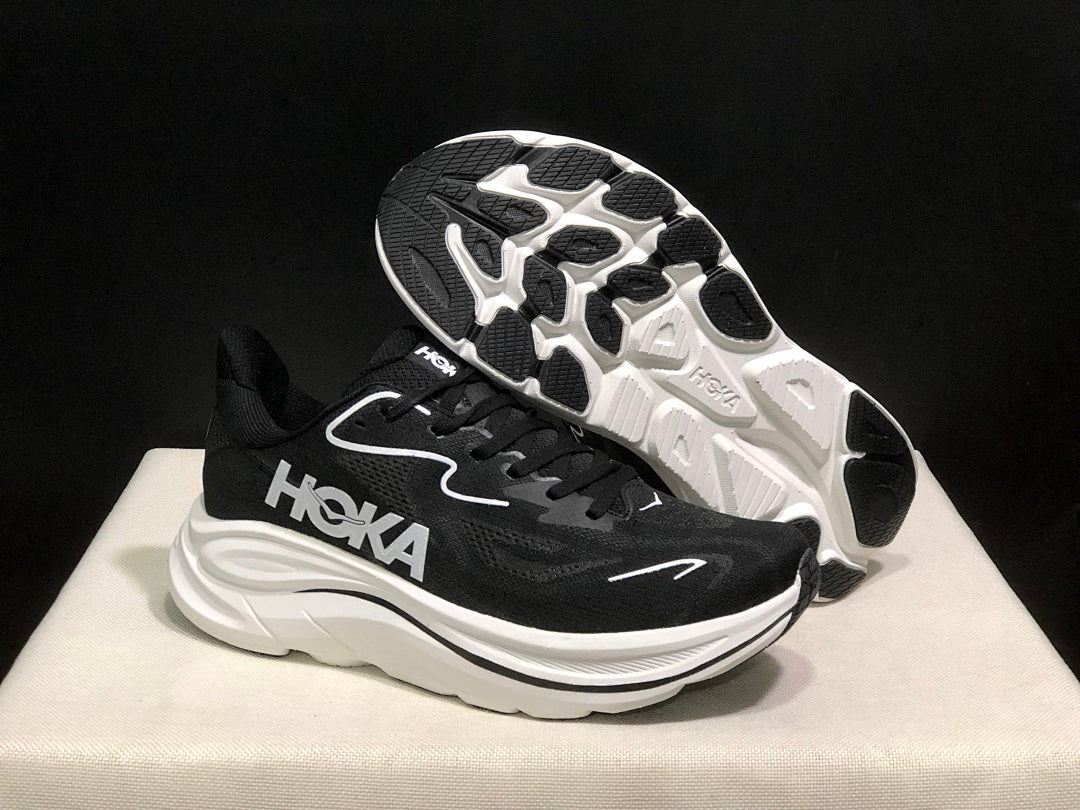 HOKA Clifton 10 Running Shoes in Black and White - product image from the listing.