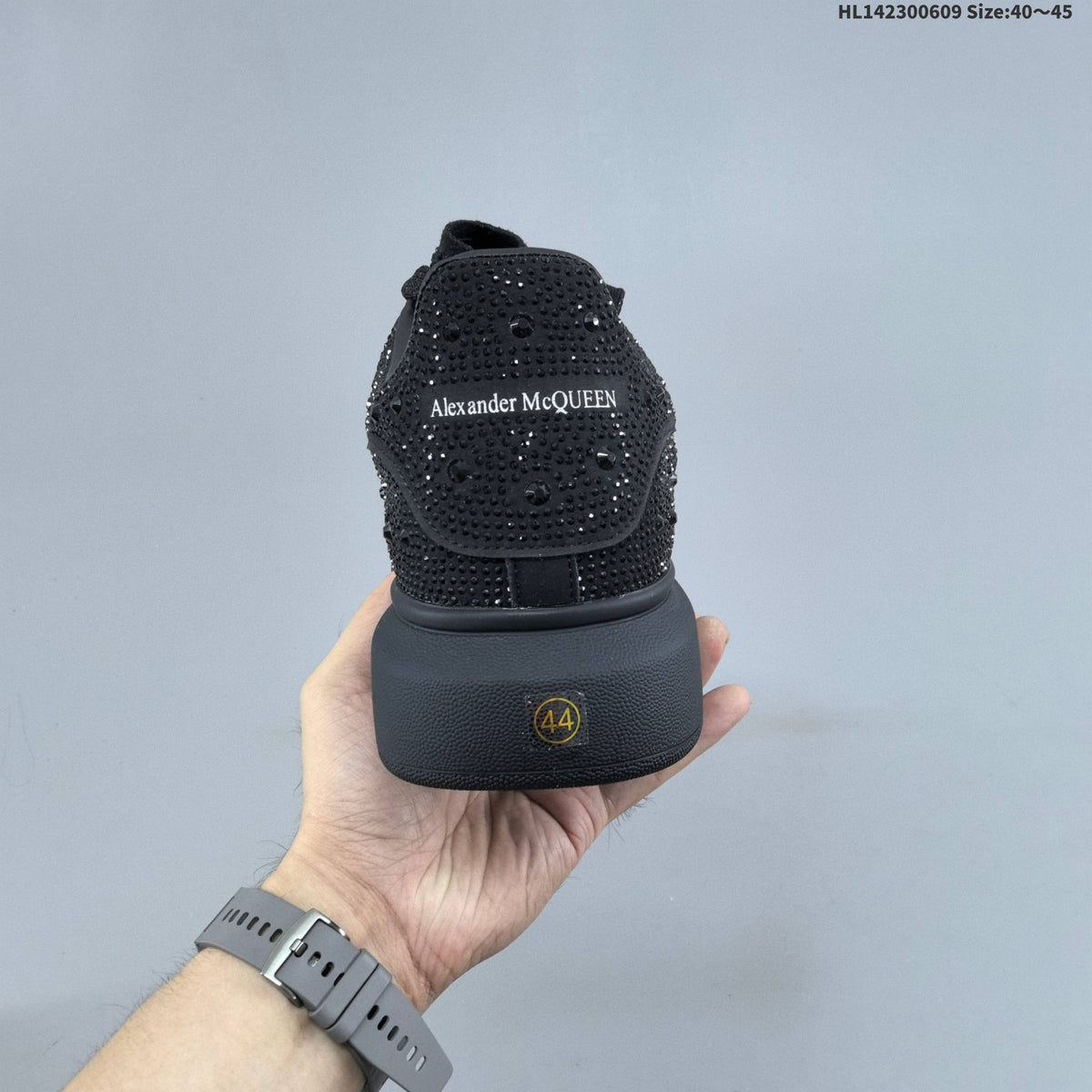 Alexander McQueen Black Crystal-Embellished Sneakers in Leather - product image from the listing.