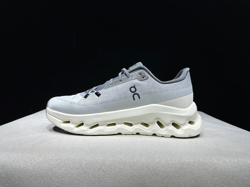 On Cloudtilt Sneakers, in Gray and White - product image from the listing.