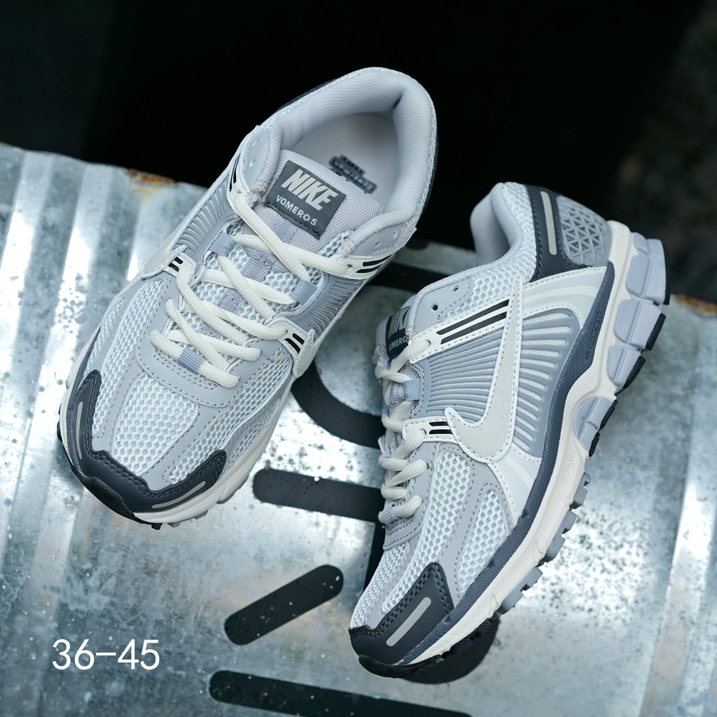 Light Gray and Navy Nike Air Zoom Vomero 5 Sneakers - product image from the listing.