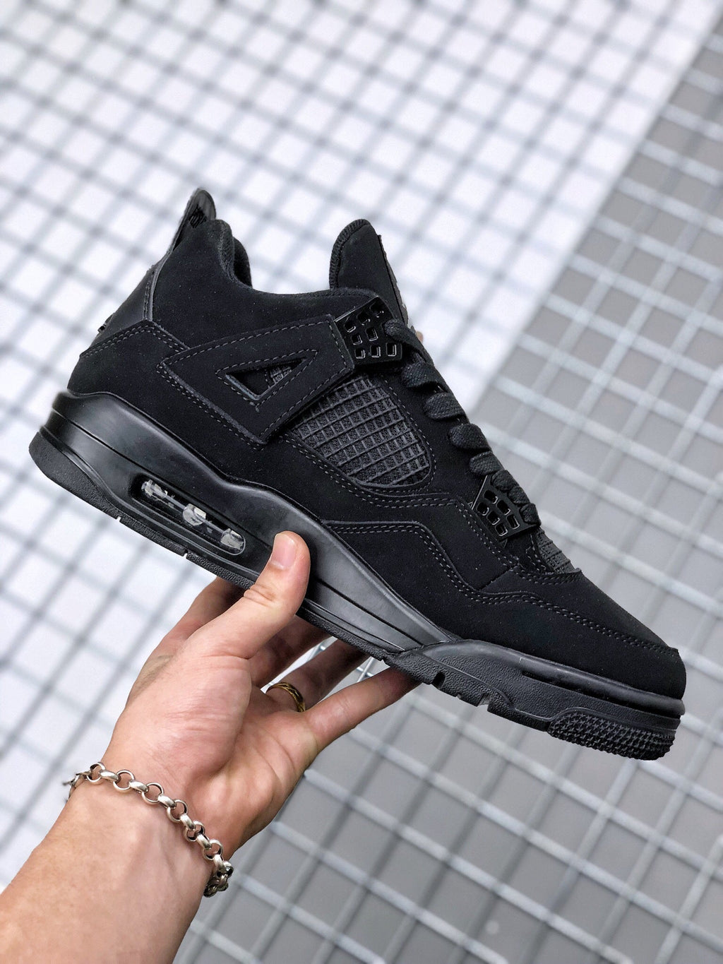 Air Jordan 4 Black Cat Sneakers CU1110-010 - product image from the listing.