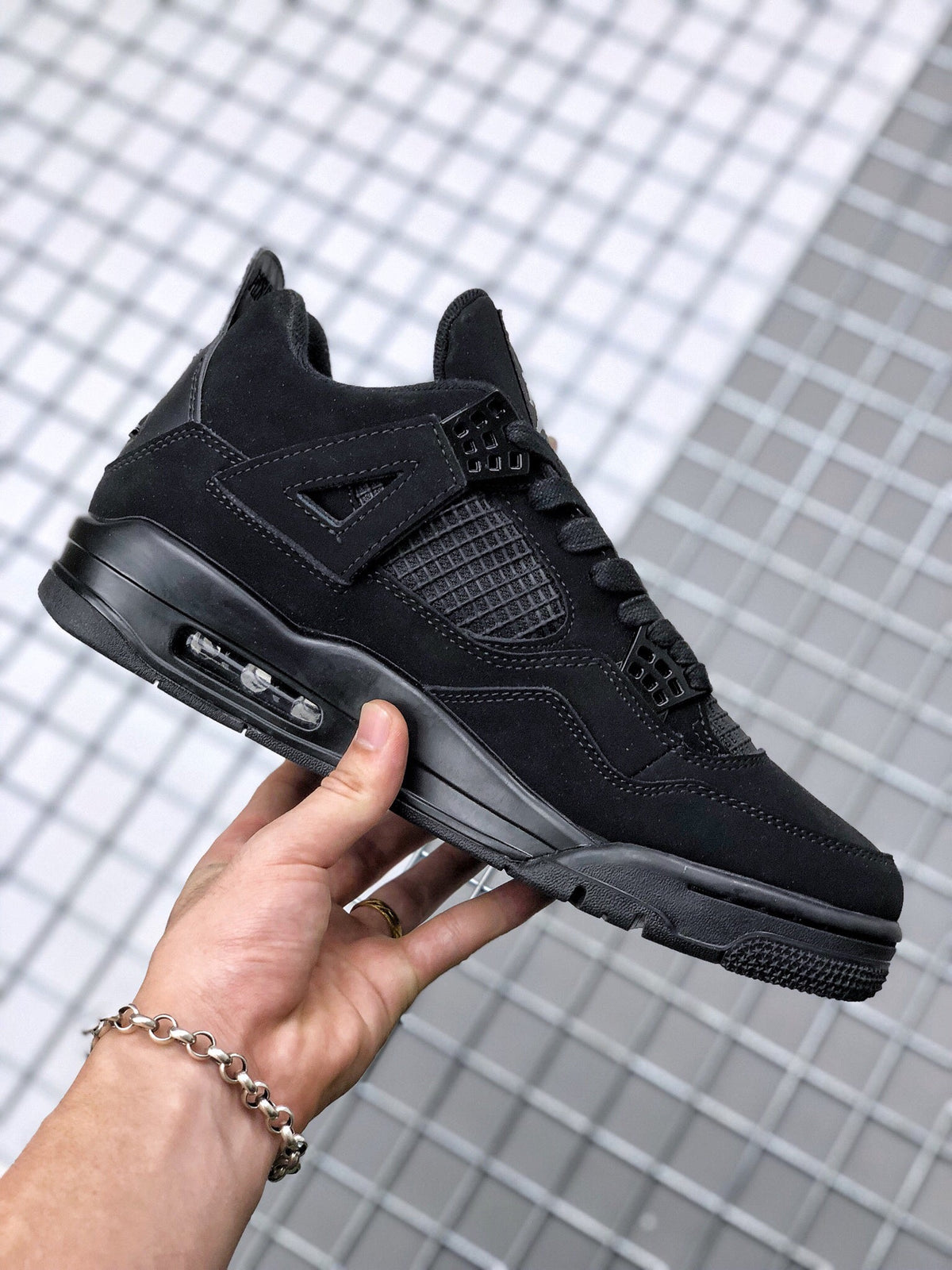Air Jordan 4 Black Cat Sneakers CU1110-010 - product image from the listing.
