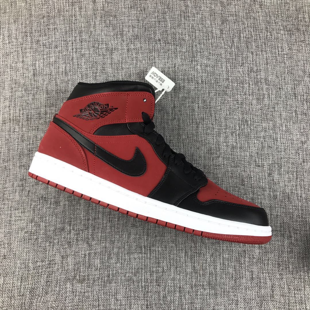Air Jordan 1 Mid Sneakers in Red, in Black and White - product image from the listing.