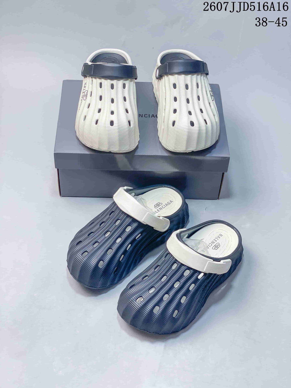 Balenciaga Logo Clogs in White and Navy 2607JJD516A16 - product image from the listing.