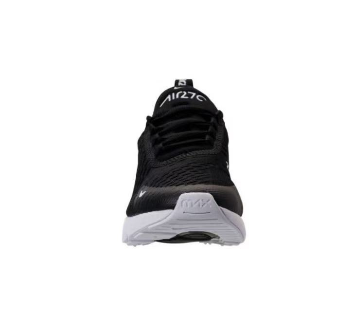 Nike Air Zoom Sneaker in Black and White - product image from the listing.