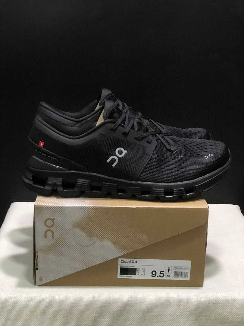 On Cloud X 4 Black Eclipse Trainers - product image from the listing.