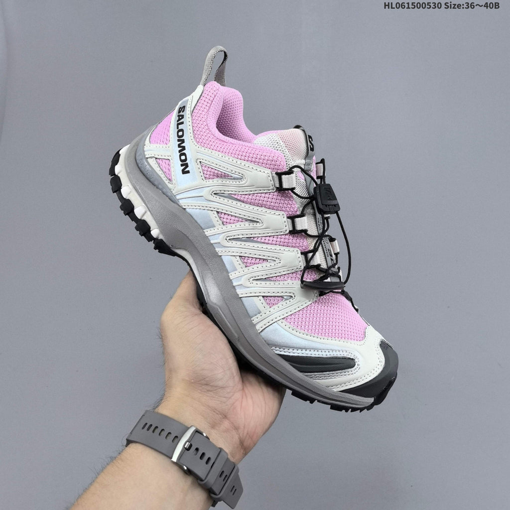 Pink and White Salomon XA PRO 3D Trail Running Shoes - product image from the listing.